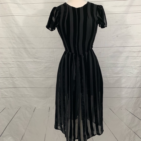 Reformation Dresses & Skirts - Reformation black stripe velour romper dress small